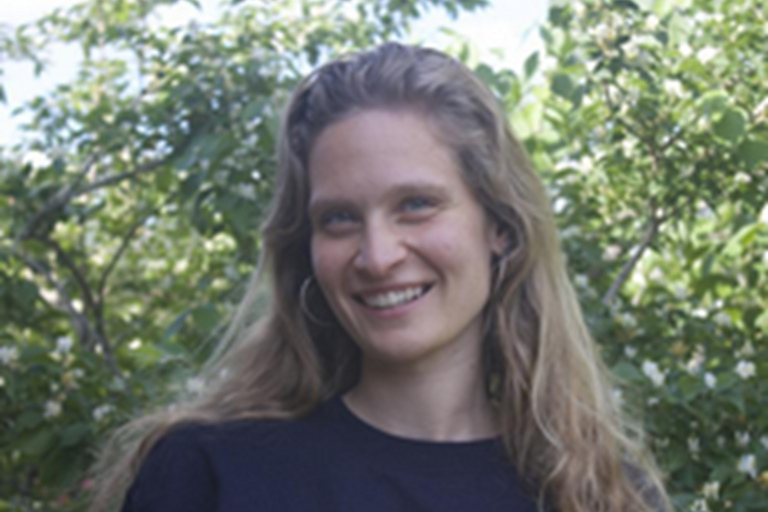 Kat Culbertson headsot - wearing a Berkeley blue and gold tshirt