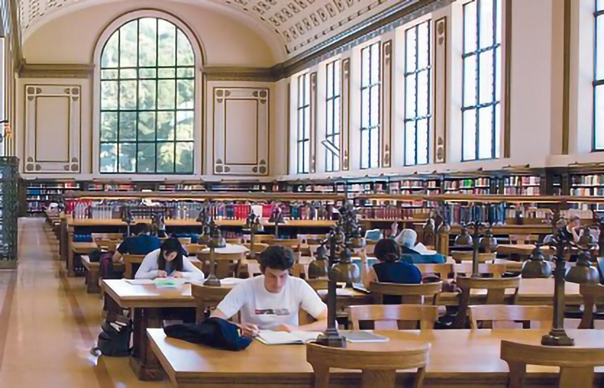 Students studying in Doe Library