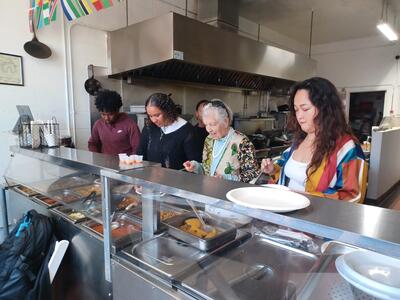 Students ordering food at Swahili Spot Restaurant.